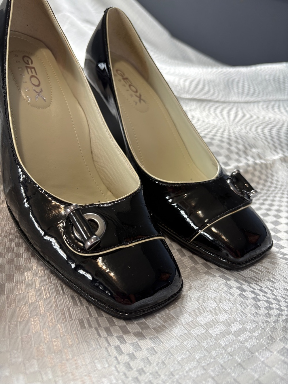 Geox Women's Black Patent Leather Square-Toe Flats with Buckle.
Perfect shoe.
